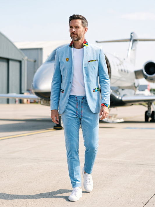 AWAKEN ART light blue velour suit with Blue artistic finishings, by a private jet